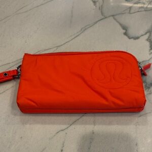 lululemon athletica Vibrant Orange puffy Wristlet